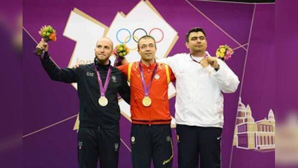 Olympics: Bronze for Narang, Saina cruises