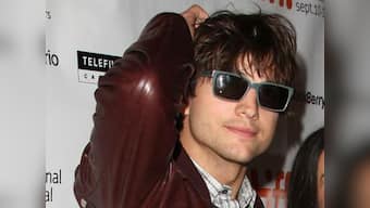 Mila Kunis, Ashton Kutcher caught in lip-lock?
