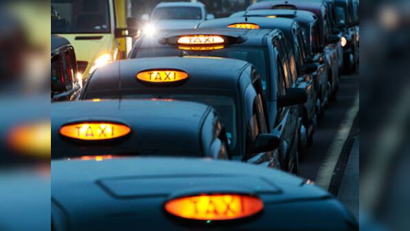 London cabbies block road to protest at Olympics lane ban