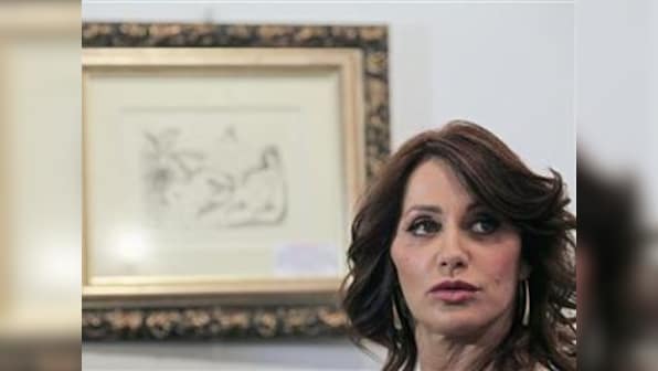 Comaneci rues the demise of perfect 10 