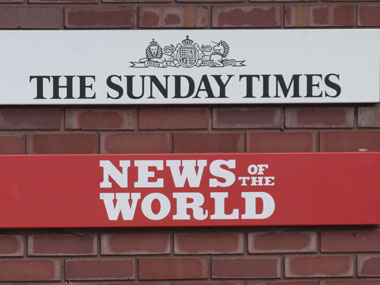 UK police arrest three in phone hacking scandal UK police arrest three in phone hacking scandal