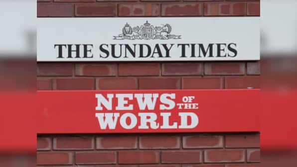 UK police arrest three in phone hacking scandal