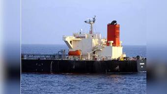 Iranian oil tanker still ablaze as search continues for missing mariners; efforts to contain spill expected to be difficult