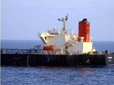 Iranian oil tanker still ablaze as search continues for missing mariners; efforts to contain spill expected to be difficult