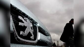 Mounting losses force Peugeot to cut 8,000 jobs