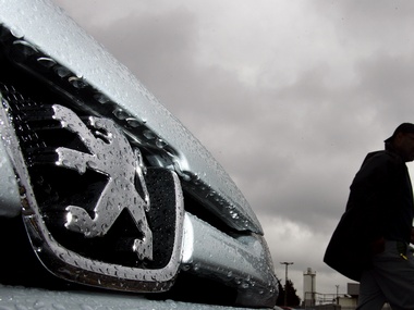 Mounting losses force Peugeot to cut 8,000 jobs Mounting losses force Peugeot to cut 8,000 jobs
