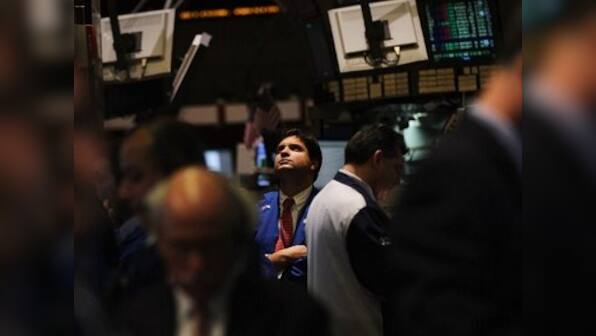 Shares rise on strong US earnings, euro steadies