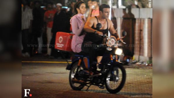 Snapped! Mallika Sherawat riding pillion with Vivek Oberoi in Mumbai!