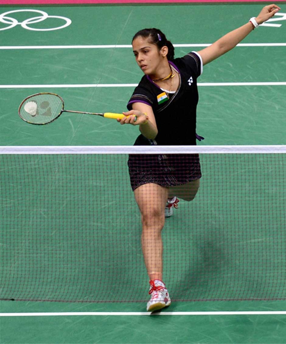 Saina in action. PTI Saina in action. PTI