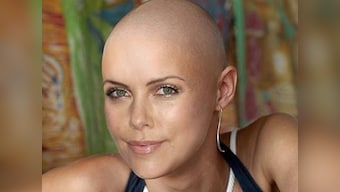 Charlize Theron not comfortable with her bald look