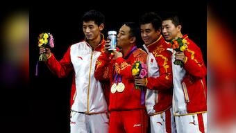 China's men retain all table tennis Olympic golds