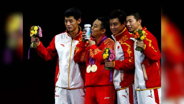 China's men retain all table tennis Olympic golds