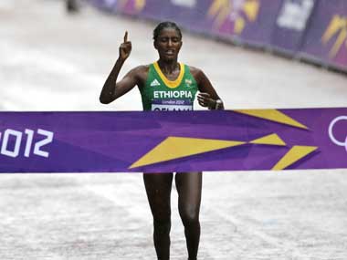 Olympics: Gelana falls twice but still wins women's marathon Olympics: Gelana falls twice but still wins women's marathon