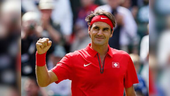 Federer in Olympics quarters, Clijsters beats Ivanovic