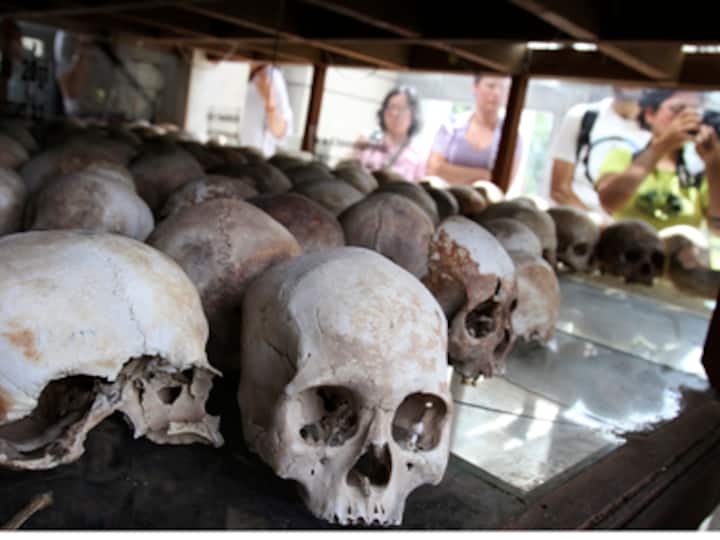 Cambodians find 20 skulls in suspected Khmer Rouge mass grave 
