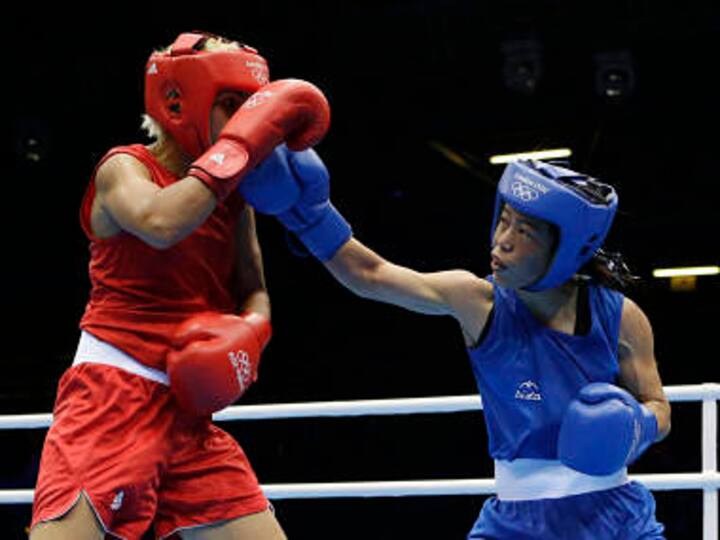 Mary Kom beats Rahali, assures India of bronze