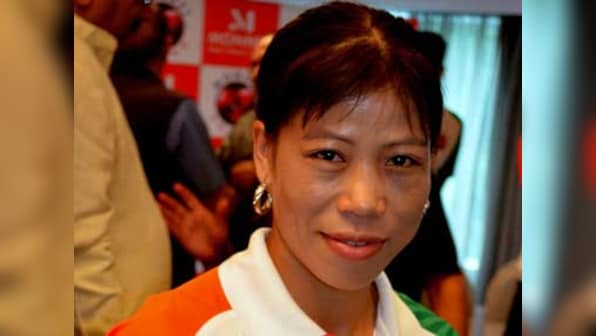 Sonia Gandhi's scowl vs Mary Kom's smile: It's a knockout...
