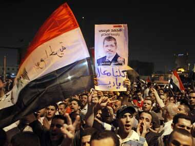 Egypt's military silently accepts Mursi's move