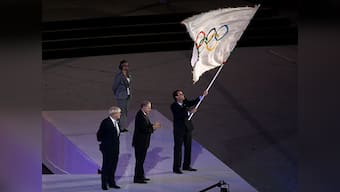 New era begins for Rio as Olympics flag arrives in Brazil