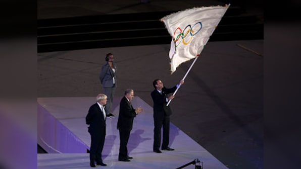 New era begins for Rio as Olympics flag arrives in Brazil