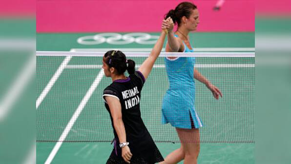 Saina shows guts in adversity