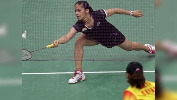 Error-prone Saina smashed out by Wang Yihan in semis