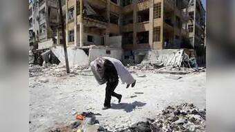 Car bomb kills 12 in Damascus suburb in Syria