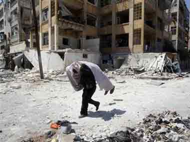 Car bomb kills 12 in Damascus suburb in Syria Car bomb kills 12 in Damascus suburb in Syria