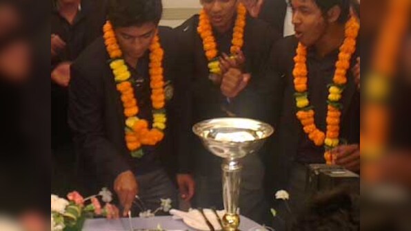 Victorious U-19 cricketers arrive to a rousing welcome