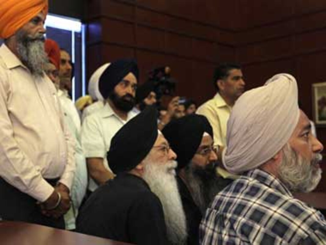 The disappearing Sikh turban: Sacred symbol, shorthand for terror-World  News , Firstpost