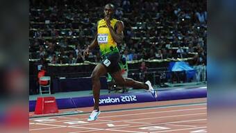 London 2012: Usain Bolt sprints into record books with 200m win