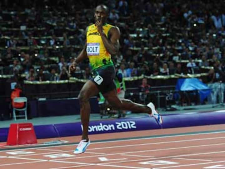 London 2012: Usain Bolt sprints into record books with 200m win