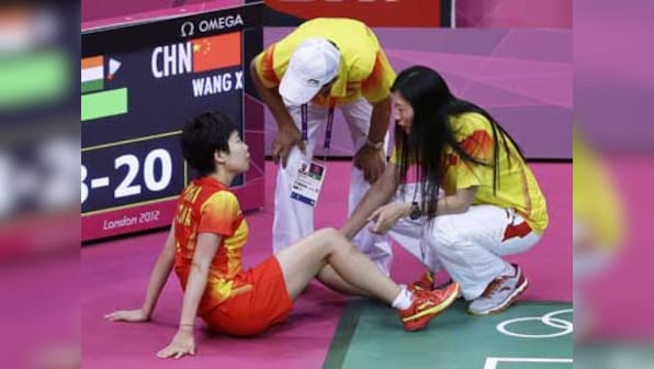 Saina's bronze: China's head coach blames ref for Xin's injury
