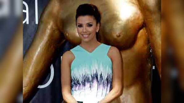 Eva Longoria borrows clothes from Victoria Beckham