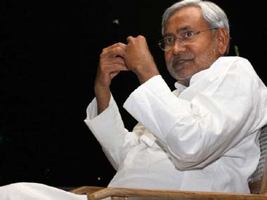 Nitish Kumar celebrates by tying rakhi to trees Nitish Kumar celebrates by tying rakhi to trees
