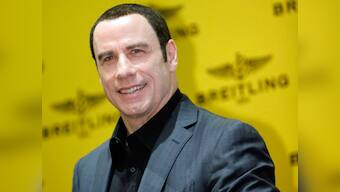 John Travolta denies sexual assault charges