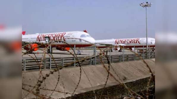 Kingfisher shares fly 20% despite wider loss