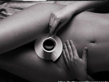 Poonam Pandey does it again.... naked but for a coffee cup! Poonam Pandey does it again.... naked but for a coffee cup!