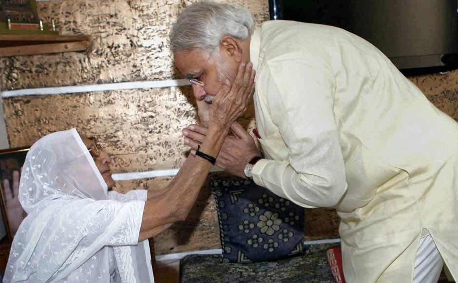 Gujarat Chief Minister Narendra Modi seeks blessing of his mother Heerabhen on his 62nd birthday in Gandhinagar. PTI Gujarat Chief Minister Narendra Modi seeks blessing of his mother Heerabhen on his 62nd birthday in Gandhinagar. PTI