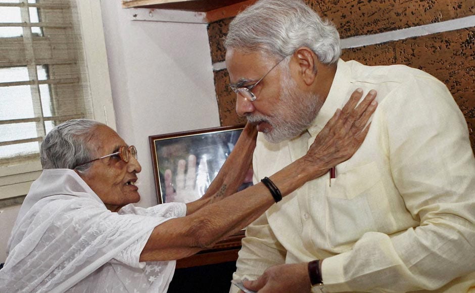 Gujarat Chief Minister Narendra Modi seeks blessing of his mother Heerabhen on his 62nd birthday in Gandhinagar. PTI Gujarat Chief Minister Narendra Modi seeks blessing of his mother Heerabhen on his 62nd birthday in Gandhinagar. PTI
