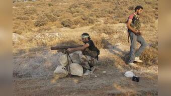 Syria envoy in capital as Assad forces pound rebels