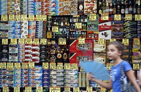 Tax hike piles misery on Spain's shoppers and small firms Tax hike piles misery on Spain's shoppers and small firms