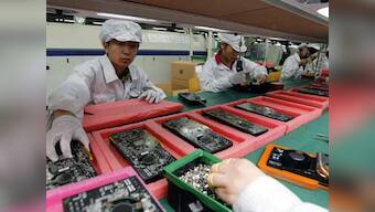 Day after violence, Foxconn's China factory resumes production
