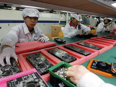Day after violence, Foxconn's China factory resumes production Day after violence, Foxconn's China factory resumes production