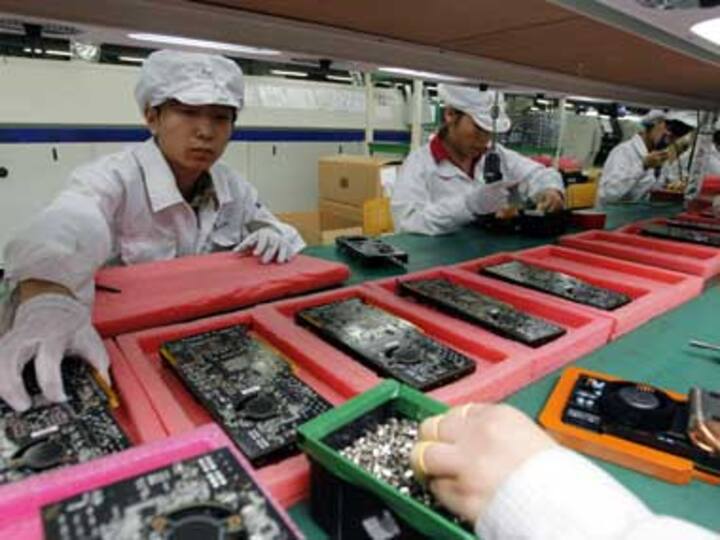 Day after violence, Foxconn's China factory resumes production 