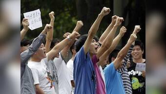 China sends patrol ships to disputed islands held by Japan