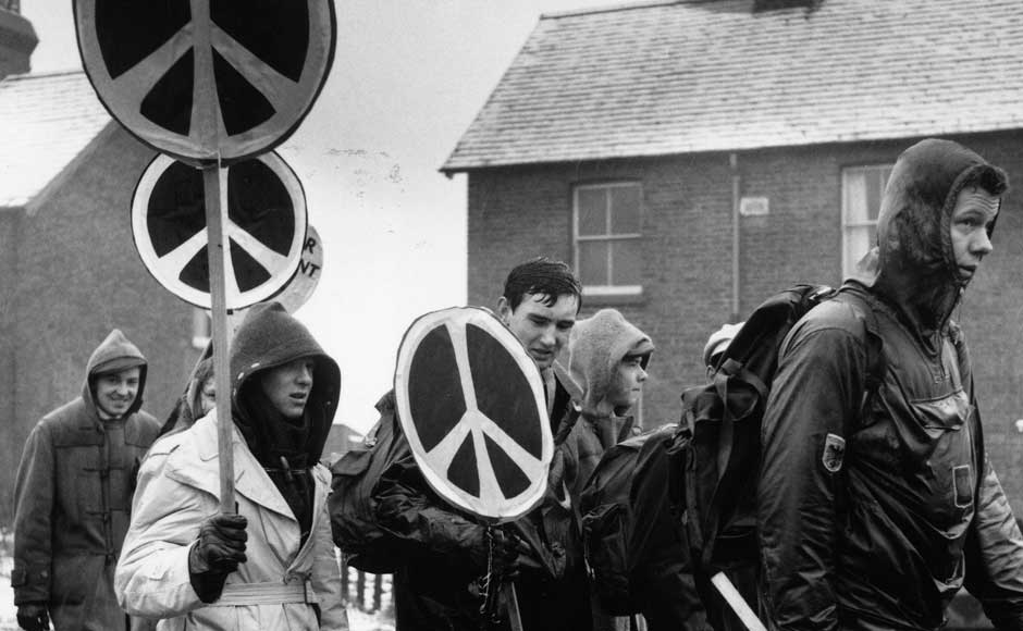Rain soaked CND marchers carrying their anti-nuclear logos at Aldermaston on 17 April 1958. Express Newspapers/Getty Images Rain soaked CND marchers carrying their anti-nuclear logos at Aldermaston on 17 April 1958. Express Newspapers/Getty Images