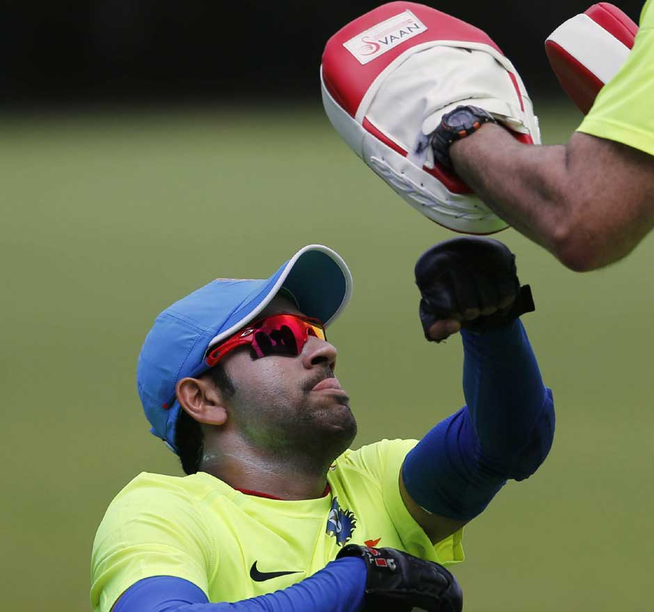 We know Rohit Sharma's a good hitter of the ball... but wonder how well he did at boxing. Here he is undergoing some cross training. AP We know Rohit Sharma's a good hitter of the ball... but wonder how well he did at boxing. Here he is undergoing some cross training. AP