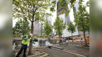 On 9/11 anniversary, debate shifts to high cost of memorial