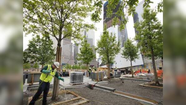 On 9/11 anniversary, debate shifts to high cost of memorial